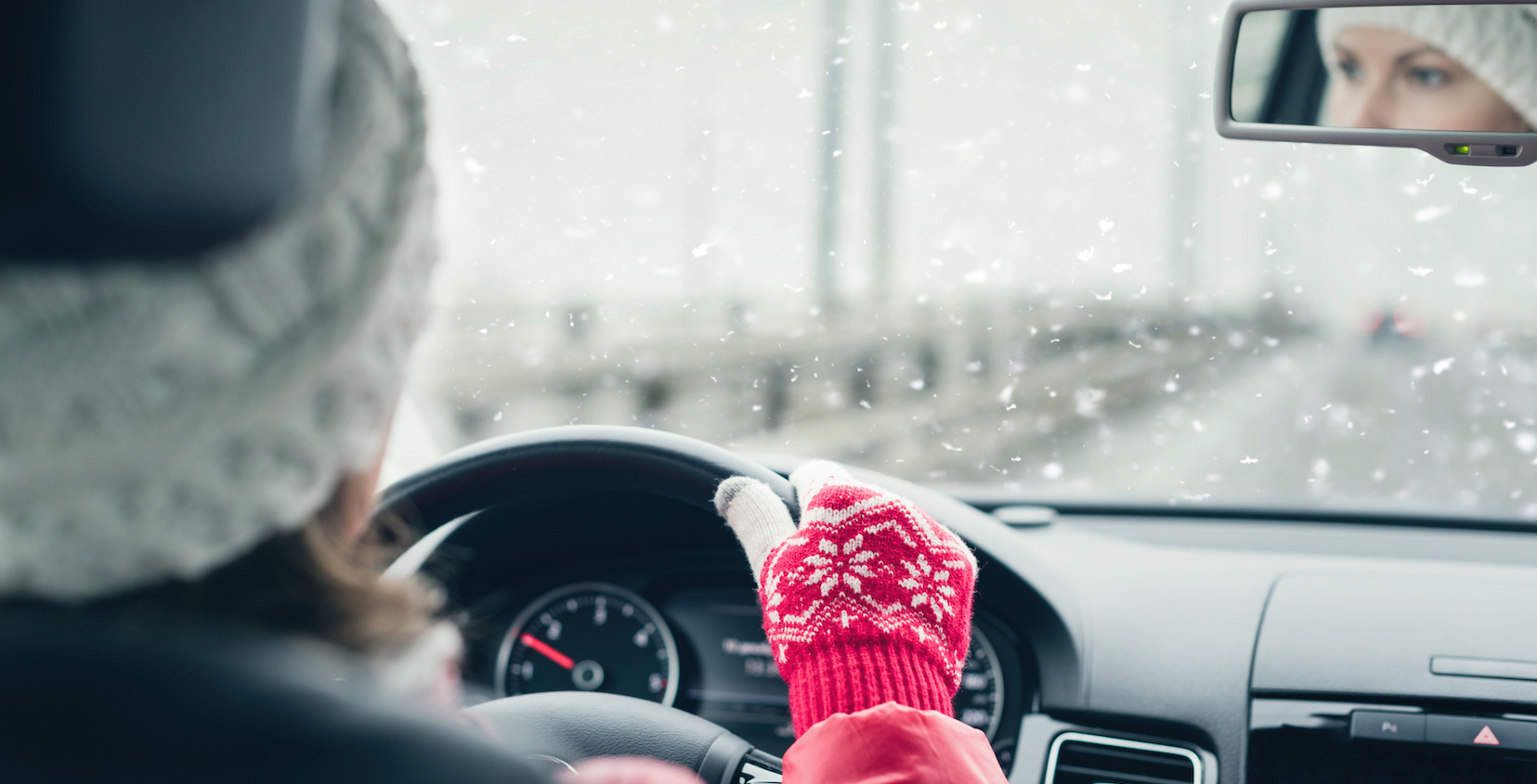 Woman driving on a winter road